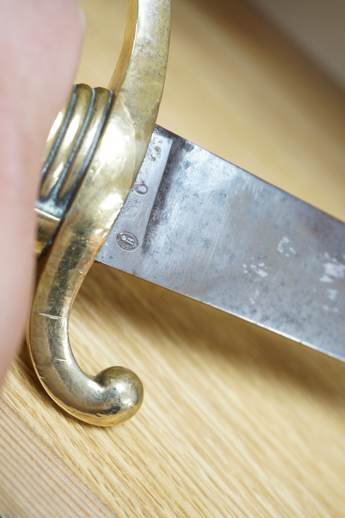 An early 19th century French sabre, the blade stamped HENRAUX, 73cm long